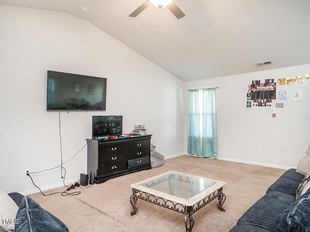 carpeted living room with lofted ceiling, a ceiling fan, and baseboards