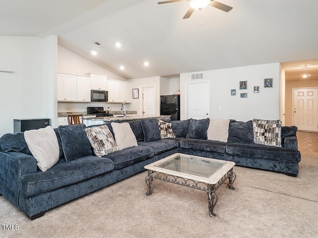 living room with carpet, ceiling fan, vaulted ceiling, and recessed lighting