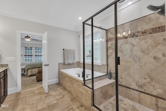3007 Krogen Ct, Creedmoor, NC 27522 - ensuite bathroom featuring a garden tub, a ceiling fan, plenty of natural light, a shower stall, and crown molding