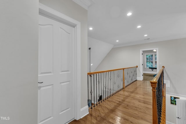 3007 Krogen Ct, Creedmoor, NC 27522 - hall with wood finished floors, recessed lighting, an upstairs landing, and baseboards