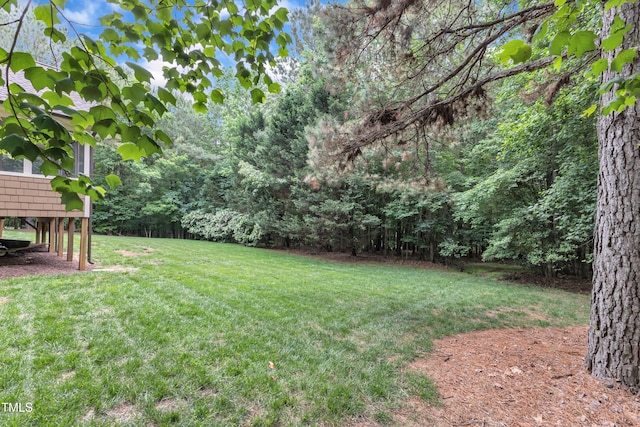 3007 Krogen Ct, Creedmoor, NC 27522 - view of green lawn featuring a forest view