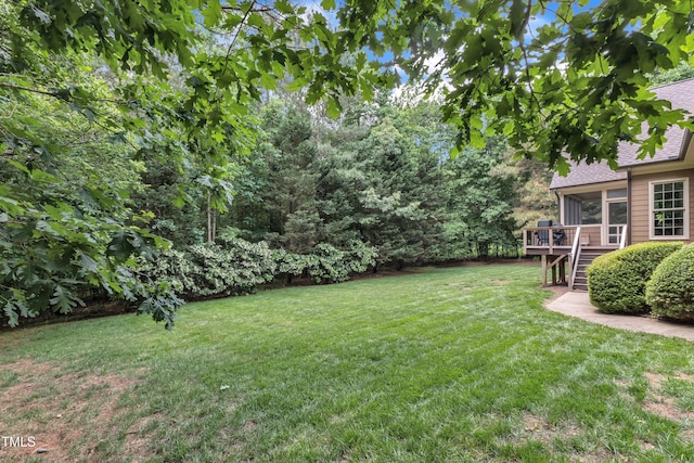 3007 Krogen Ct, Creedmoor, NC 27522 - view of green lawn with a sunroom, stairway, and a wooden deck