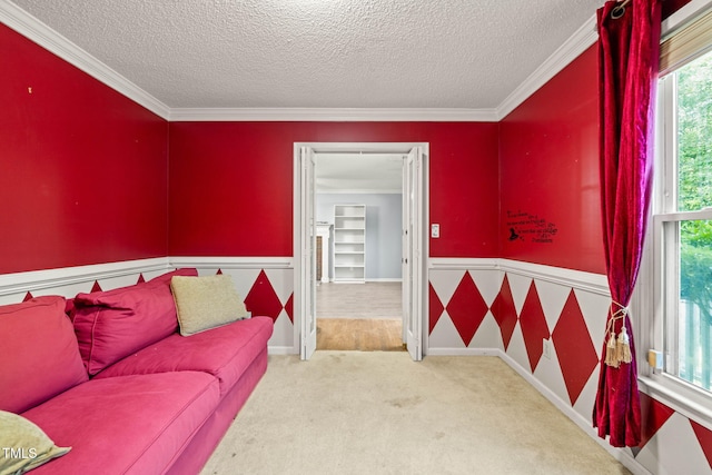 3 Cobble Glen Ct, Durham, NC 27713 - living room with a textured ceiling, crown molding, wainscoting, and carpet flooring