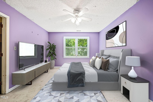 3 Cobble Glen Ct, Durham, NC 27713 - bedroom featuring a textured ceiling, light colored carpet, and ceiling fan