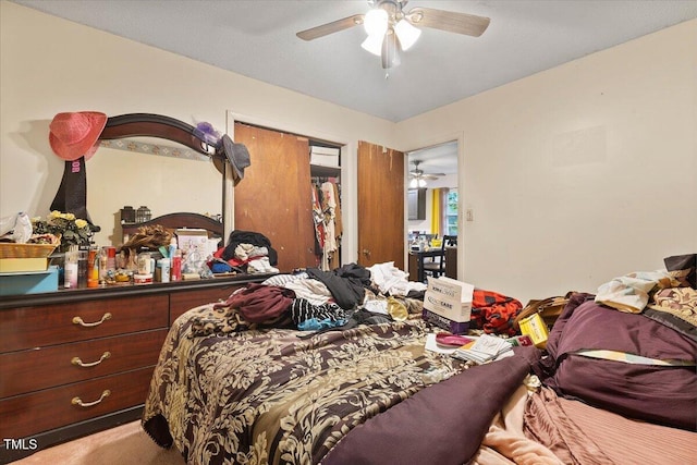 bedroom featuring carpet floors and a ceiling fan