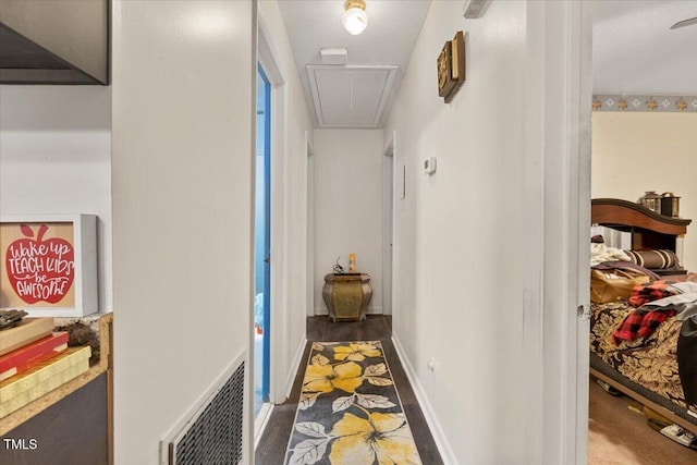 hallway featuring attic access