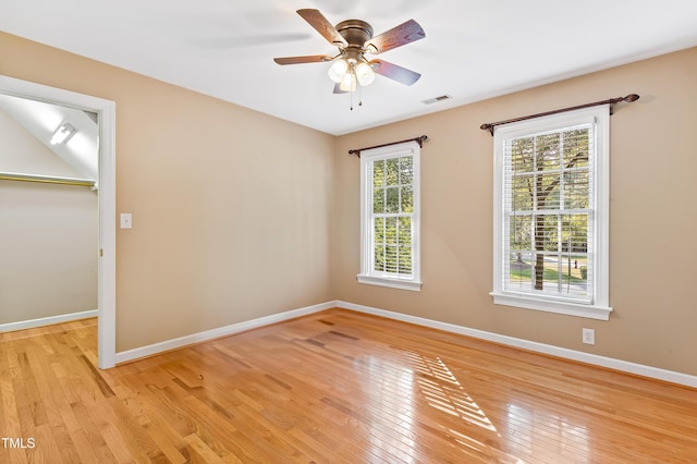 6201 King Croydon Ct, Raleigh, NC 27603 - unfurnished room featuring light wood-style flooring and a ceiling fan