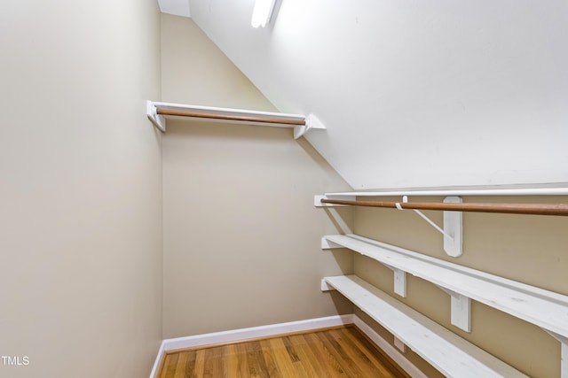 6201 King Croydon Ct, Raleigh, NC 27603 - spacious closet featuring vaulted ceiling and wood finished floors