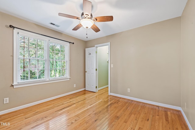 6201 King Croydon Ct, Raleigh, NC 27603 - spare room featuring wood-type flooring and a ceiling fan