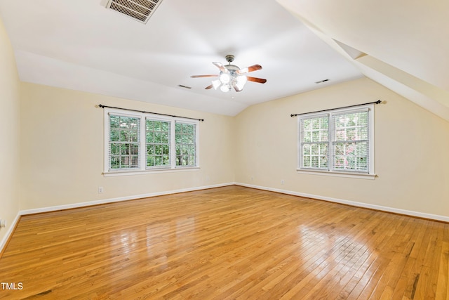6201 King Croydon Ct, Raleigh, NC 27603 - unfurnished room featuring healthy amount of natural light, light wood-style floors, lofted ceiling, and a ceiling fan