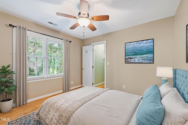 6201 King Croydon Ct, Raleigh, NC 27603 - bedroom featuring light wood finished floors and ceiling fan