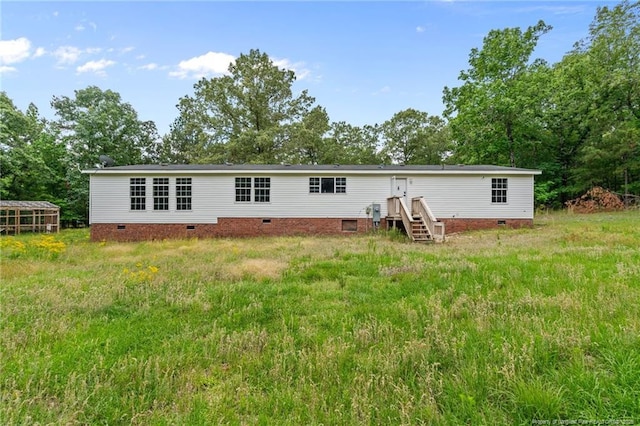 back of property with crawl space