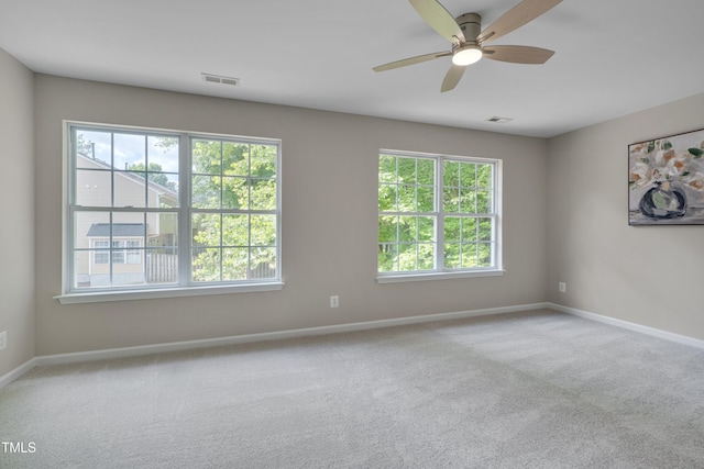 314 Virens Dr, Cary, NC 27511 - carpeted empty room with plenty of natural light, baseboards, and ceiling fan