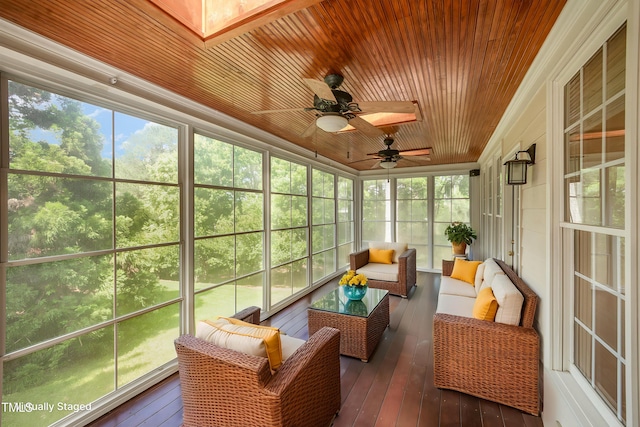 sunroom featuring ceiling fan and an outdoor hangout area