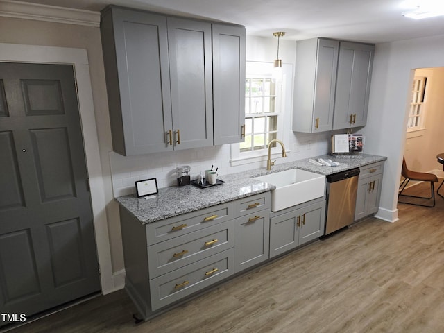 3669 W Greensboro Chapel Hill Rd, Liberty, NC 27298 - kitchen featuring stainless steel dishwasher, gray cabinetry, a sink, backsplash, and ornamental molding