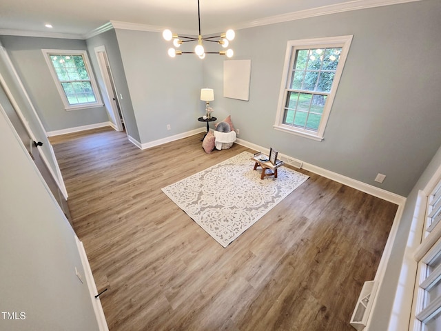 3669 W Greensboro Chapel Hill Rd, Liberty, NC 27298 - unfurnished dining area with baseboards, crown molding, wood finished floors, a chandelier, and recessed lighting