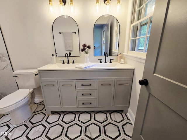 3669 W Greensboro Chapel Hill Rd, Liberty, NC 27298 - bathroom with double vanity and toilet