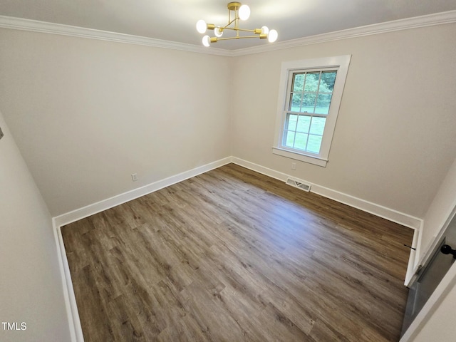3669 W Greensboro Chapel Hill Rd, Liberty, NC 27298 - unfurnished room featuring crown molding, a chandelier, baseboards, and wood finished floors