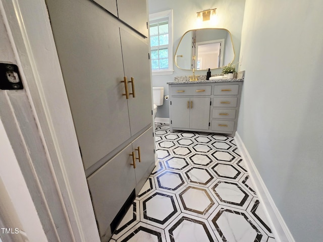 3669 W Greensboro Chapel Hill Rd, Liberty, NC 27298 - bathroom featuring vanity, baseboards, and toilet