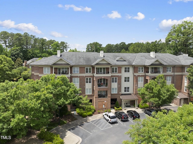 340 Allister Dr Unit 301, Raleigh, NC 27609 - view of property featuring uncovered parking