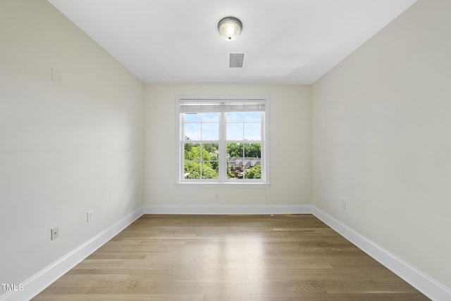 340 Allister Dr Unit 301, Raleigh, NC 27609 - empty room featuring baseboards and light wood finished floors