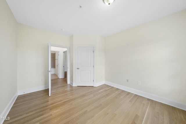 340 Allister Dr Unit 301, Raleigh, NC 27609 - spare room featuring light wood-style floors and baseboards