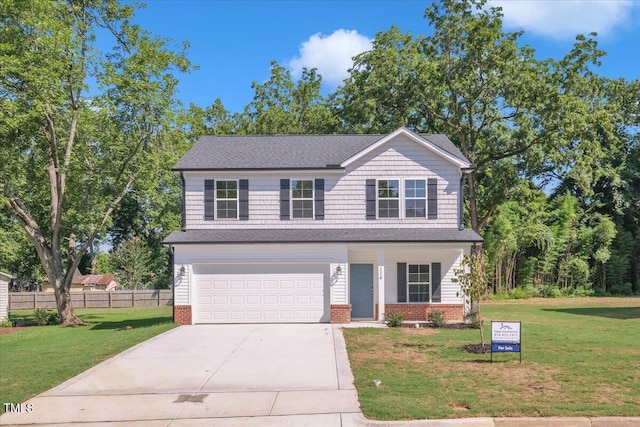 114 Hays St, Oxford, NC 27565 - view of front of home featuring concrete driveway, brick siding, and a garage