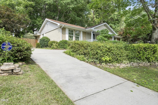 1201 Pond St, Cary, NC 27511 - view of home's exterior featuring driveway
