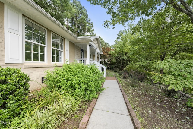 1201 Pond St, Cary, NC 27511 - view of side of home featuring brick siding