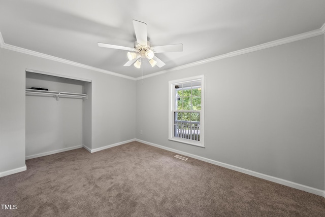 1201 Pond St, Cary, NC 27511 - unfurnished bedroom with ornamental molding, carpet floors, a closet, and ceiling fan