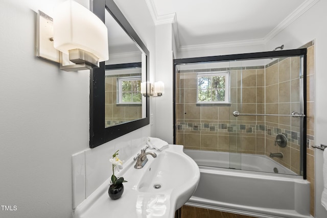 1201 Pond St, Cary, NC 27511 - bathroom with ornamental molding, shower / bath combination with glass door, and healthy amount of natural light
