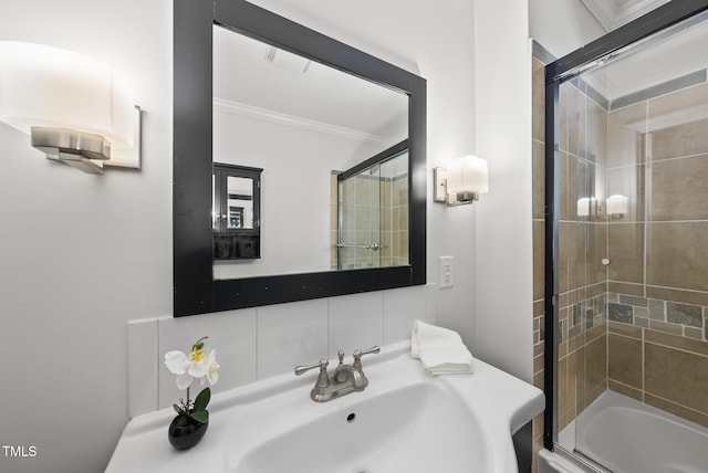 1201 Pond St, Cary, NC 27511 - full bathroom featuring crown molding and shower / bath combination with glass door