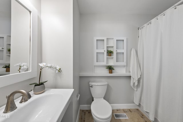 1201 Pond St, Cary, NC 27511 - bathroom with a shower with shower curtain