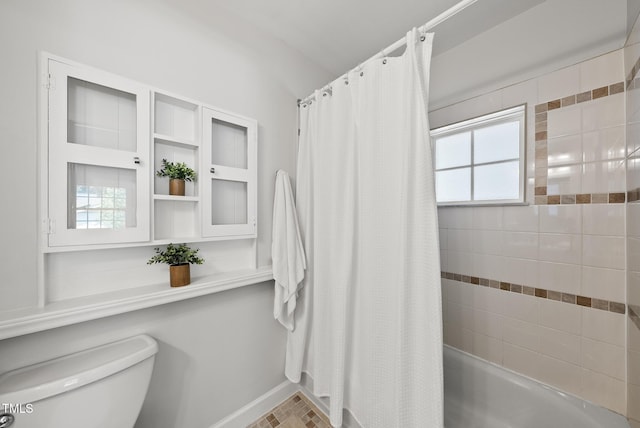 1201 Pond St, Cary, NC 27511 - bathroom with toilet and shower / tub combo with curtain