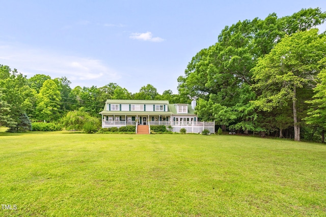 view of front of home with a porch and a front lawn
