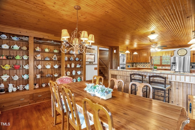 771 Cedar Grove Church Rd, Roxboro, NC 27574 - dining room with a chandelier, stairs, wooden ceiling, wood finished floors, and ceiling fan