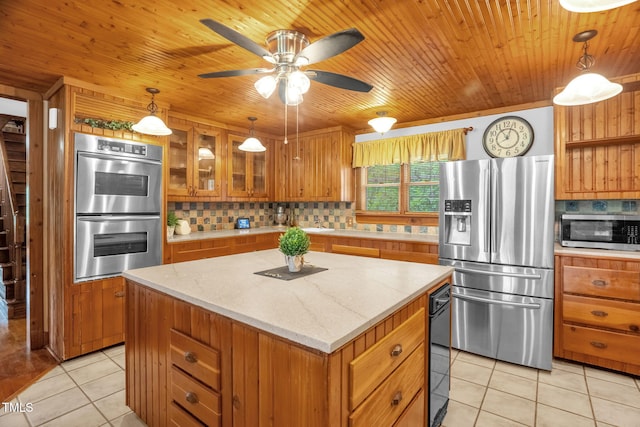 771 Cedar Grove Church Rd, Roxboro, NC 27574 - kitchen featuring stainless steel appliances, brown cabinets, light tile patterned floors, decorative backsplash, and wood ceiling