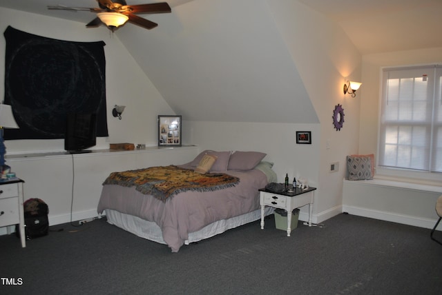 bedroom featuring vaulted ceiling, carpet floors, and ceiling fan