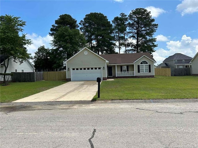 ranch-style house featuring an attached garage, concrete driveway, and a porch