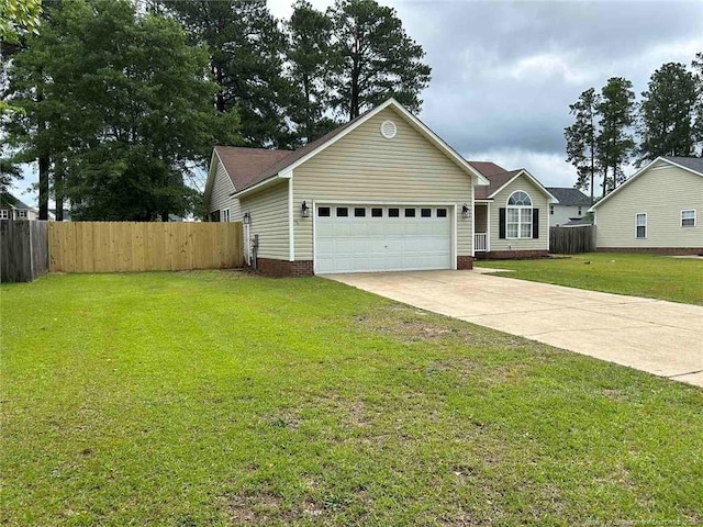 single story home featuring a garage and driveway
