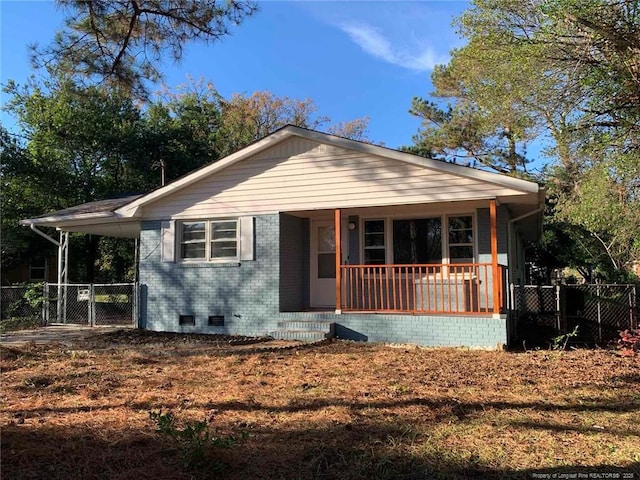 4212 Forest View Dr, Fayetteville, NC 28304 - view of front of home with a porch, crawl space, fence, and a gate