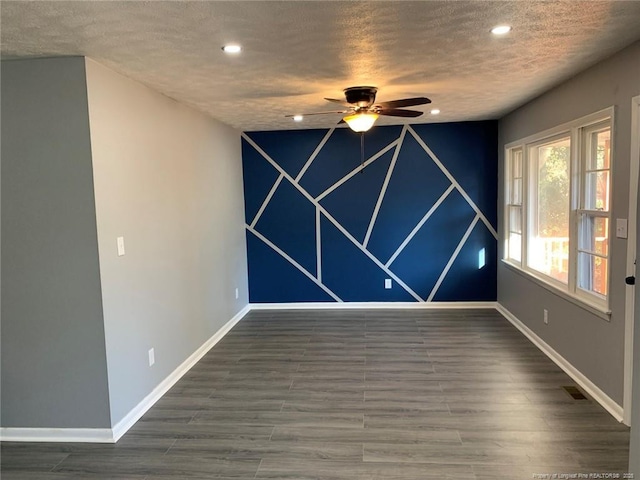 4212 Forest View Dr, Fayetteville, NC 28304 - unfurnished room featuring ceiling fan, baseboards, a textured ceiling, wood finished floors, and recessed lighting