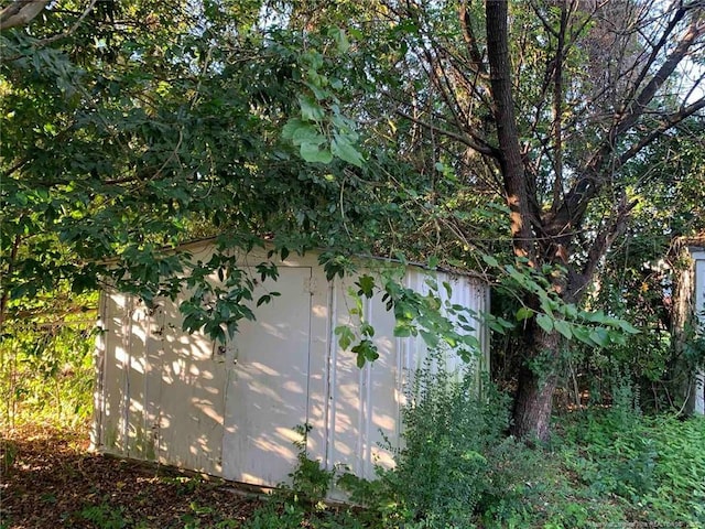 4212 Forest View Dr, Fayetteville, NC 28304 - view of home's exterior with a storage shed and an outbuilding