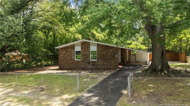 2105 Lombardy Dr, Fayetteville, NC 28304 - mid-century inspired home featuring brick siding and driveway