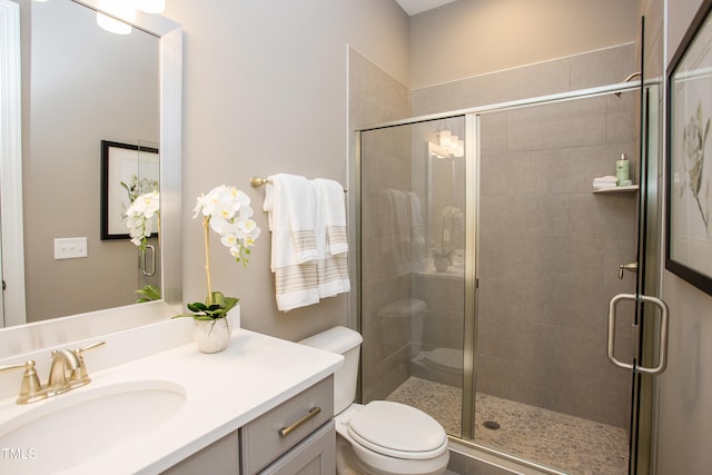 1412 Auman Rd, Raleigh, NC 27603 - bathroom featuring a stall shower, vanity, and toilet