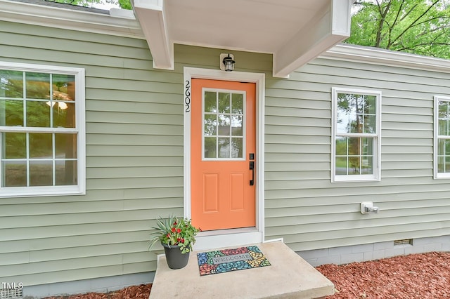 view of exterior entry featuring crawl space