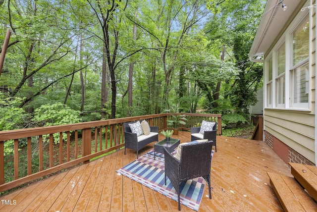 wooden deck with outdoor lounge area