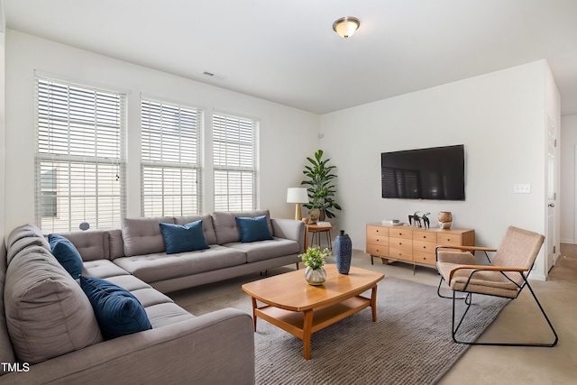 living area with light colored carpet
