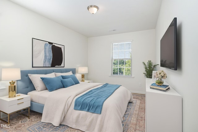 bedroom with baseboards