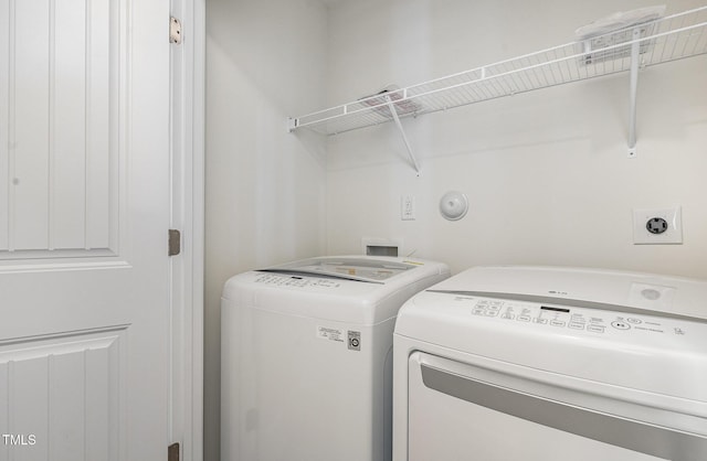 laundry area featuring independent washer and dryer